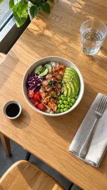 A salmon poke bowl in the camera view